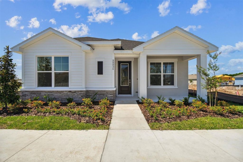 Photo of 28834 Hillcrest Valley Boulevard, Wesley Chapel, FL 33543 (MLS # T3517856)