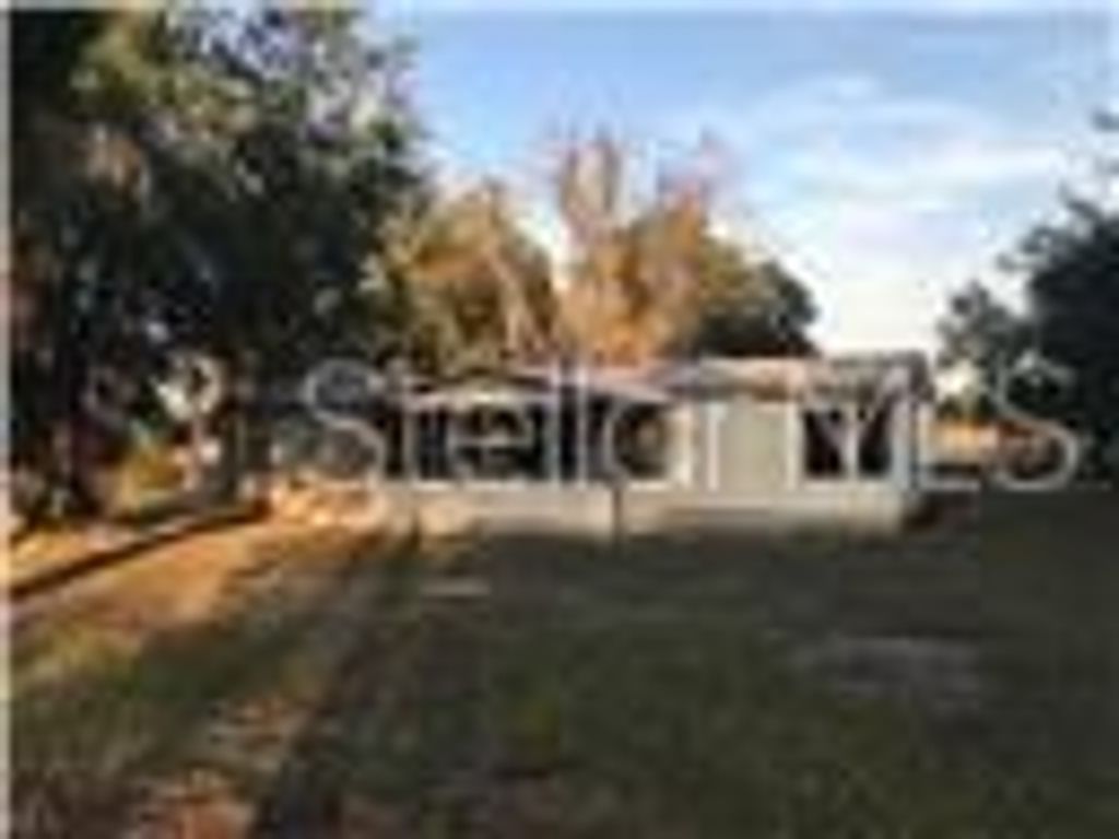 Photo of 11821 SE 123rd Avenue, Ocklawaha, FL 32179 (MLS # OM714604)