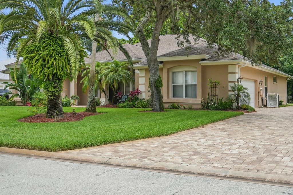 Photo of 33 Coquina Ridge Way, Ormond Beach, FL 32174 (MLS # V4943126)