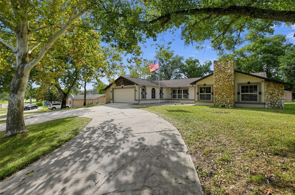 Photo of 12304 Coronado Drive, Spring Hill, FL 34609 (MLS # O6453911)