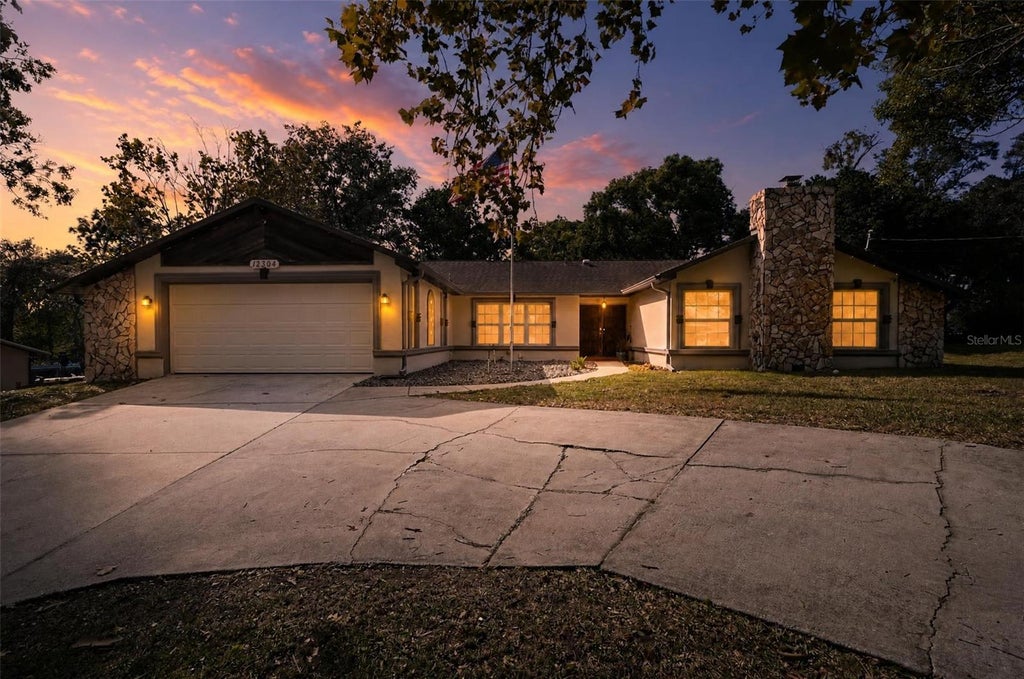Photo of 12304 Coronado Drive, Spring Hill, FL 34609 (MLS # O6453911)