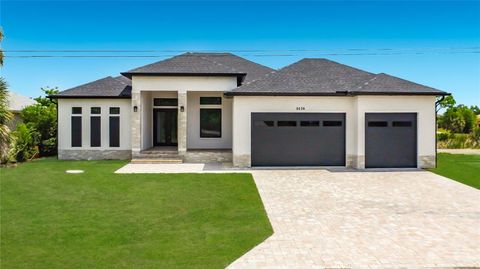 Photo of 9524 Singer Circle, Port Charlotte, FL 33981 (MLS # O6401825)