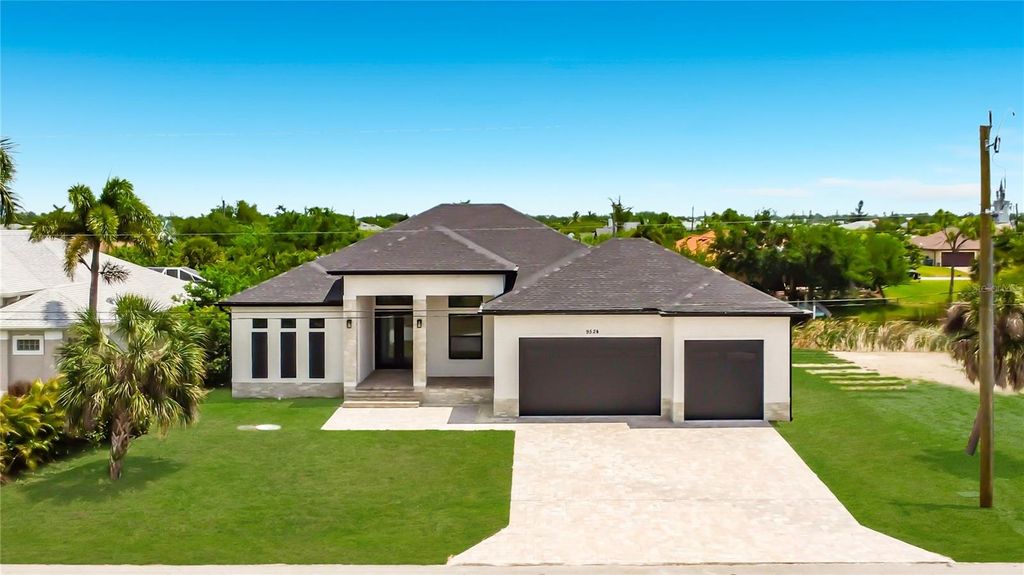 Photo of 9524 Singer Circle, Port Charlotte, FL 33981 (MLS # O6401825)