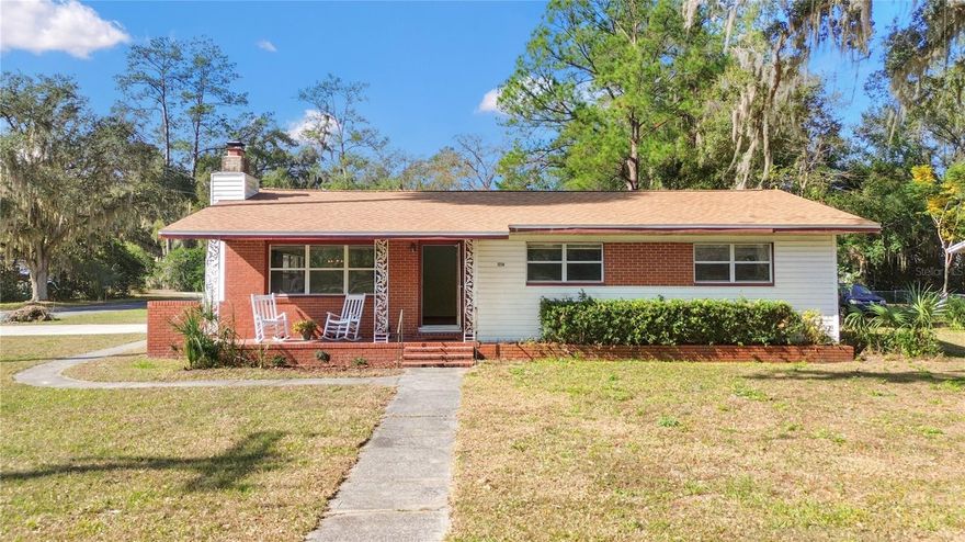 -FISHER PARK- Looking for your dreamy new retreat in the heart of Ocala? Welcome to 2236 SE 8th Avenue, a 1962 block home offering charm and character in a primetime location PLUS modern, big ticket upgrades such as a 2024 ROOF and 2025 full-home repipe. Your new home sits on a corner lot facing stunning Oak Trees- the front porch overlooking Fisher Park. Two white rocking chairs are placed perfectly on the covered front porch. Enjoy your morning coffee out front watching birds and park goers. Step inside on to refinished original hardwood floors, a true find previously hidden under carpet. The beautiful hardwoods flow through the living room, dining room, 3 bedrooms and hallway- tile located in the kitchen and two full baths. The living room/ dining room combo boasts amazing natural light as the large windows overlook the Park. The brick wood burning fireplace is a focal point in the living room too. The kitchen is spacious for cooking and leads to the single-car garage and laundry in the back. Down the hall, there is a full bathroom with tub/ shower combo on your left and the first of 3 bedrooms on the right. This room would make a great office or craft room. The next bedroom to your right, another bedroom overlooking the Park, is the largest! Across the hall and facing the backyard now, is the primary bedroom suite; a room big enough to fit your King-sized bed with ensuite full bathroom including step-in shower. The backyard is a blank canvas with mature shrubbery lining its perimeter. The metal storage shed conveys. Full Home Re-pipe (2025), Roof (2024), HVAC (2014). City of Ocala, public water and sewer. Fisher Park is a 5.14 acre park located within the City of Ocala offering sidewalks, a basketball court, bbq grills, exercise and playground equipment, and picnic tables for your enjoyment. St. John and Cornerstone Schools located just outside of the neighborhood and public school zoning includes Osceola Middle and Forest High Schools. NO HOA/ NO Restrictions! Spend your days relaxing at the Park!