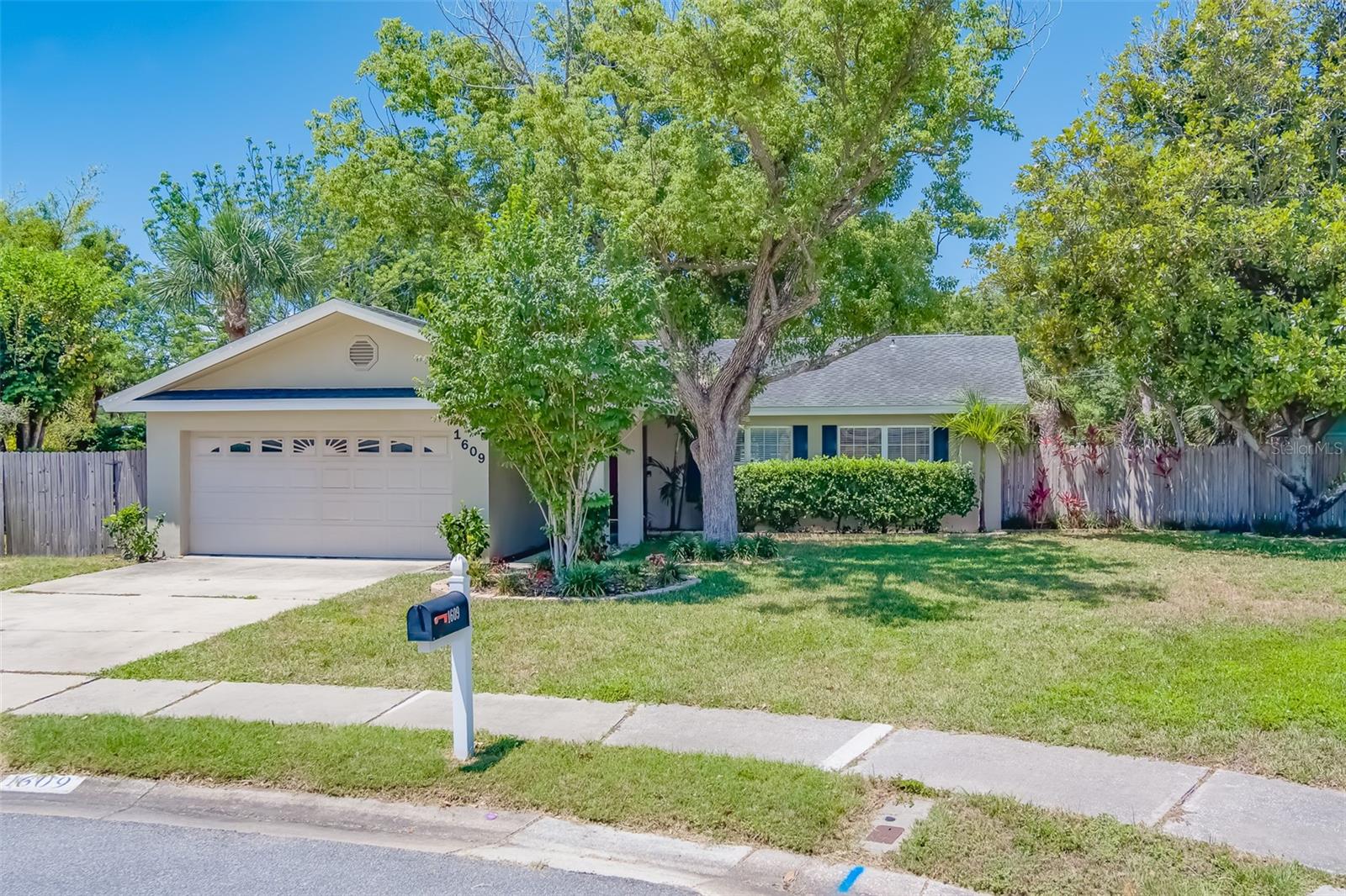 Captivating single-family pool home in Dunedin, FL. Welcome to 1609 Summit Way, a 3-bedroom, 2.5 bathroom home nestled in a quaint neighborhood just minutes from downtown Dunedin. This residence offers comfortable and practical living. Situated in the highly sought-after Amberlea Neighborhood, you'll enjoy proximity to Clearwater beach, Honeymoon Island, Downtown Dunedin, Pinellas Trail, Countryside mall & more. Experience the convenience of city living without sacrificing tranquility. Step inside to discover this thoughtfully designed living space. The open floor plan seamlessly connects the living and kitchen areas, creating an inviting atmosphere for both daily life and entertaining guests. The heart of the home, the kitchen is equipped with custom cabinetry, oversized island and a spacious countertop. Perfect for those who like to cook and entertain alike. Check out the primary suite, a large comfortable space featuring space for a home office or nice sitting area and ensuite bathroom. This split floor plan has 2 additional bedrooms that are generously sized, providing flexibility for families or guests with a guest bathroom just steps away. Step outside to the massive covered enclosed porch overlooking your saltwater pool with all new pool filter and pump and a massive, fully fenced backyard, a private oasis for relaxation and entertainment. The home has been meticulously maintained and ready for you to move right in. You have plenty of street parking along with a large driveway and 2 car garage. There is ample space in the back side yard for RV/BOAT PARKING with electric and water hook ups. Don't miss the opportunity to make 1609 Summit Way, your home. Schedule a private tour and experience the lifestyle that awaits.
