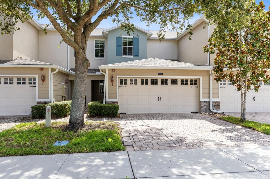 Photo of 1327 Priory Circle #1327, Winter Garden, FL 34787 (MLS # O6434028)