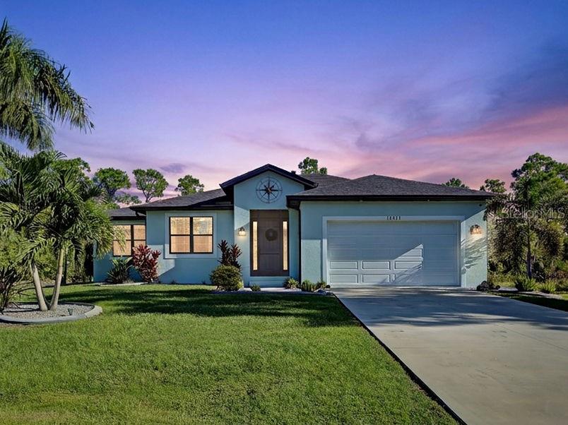 Photo of 14921 San Domingo Boulevard, Port Charlotte, FL 33981 (MLS # N6146296)