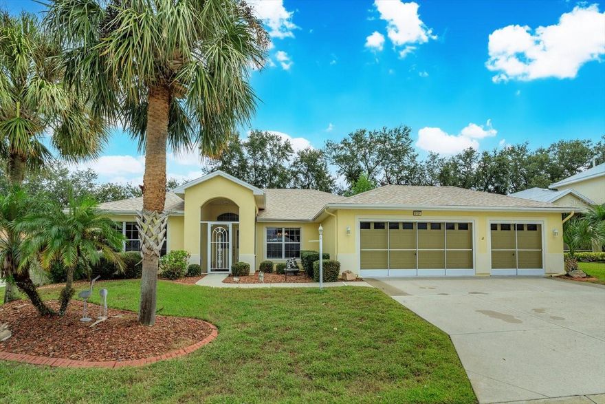 Welcome home to your dream 55+ community in beautiful Lake County! Royal Harbor offers dozens of amenities and there is a club for just about any interest! See the list of community offerings attached to this listing! This home offers four full bedrooms, Two baths, full three car garage, a screen enclosed pool with both covered and open deck Space. The front door is screen enclosed for added weather and bug protection. Upon entering this home you will see open living space with beautiful wood floors and high ceilings. The floorplan offers a three way split with the primary bedroom off to the left back of the home, the fourth bedroom off to the left front and bedrooms two and three on the far right side of the home. The kitchen offers 42" wood cabinets, granite countertops, new stainless steel appliances, a 10' breakfast bar, laundry room access and a 10x9 eating space with pool views. The Primary bedroom is 19x13 and offers a large walk in closet, Electric Wall heater, dual sinks, linen closet, soaking tub, a separate shower and a frosted window for natural light. Community has a fishing pier on Little Lake Harris and offers RV/Boat storage. This home is ready for a new owner, call for your private showing today!