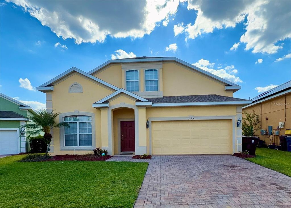 Photo of 334 Cadiz Loop, Davenport, FL 33837 (MLS # O6408485)