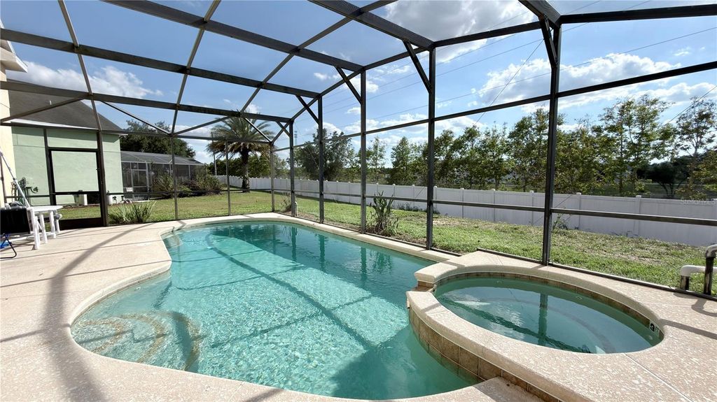 Photo of 334 Cadiz Loop, Davenport, FL 33837 (MLS # O6408485)