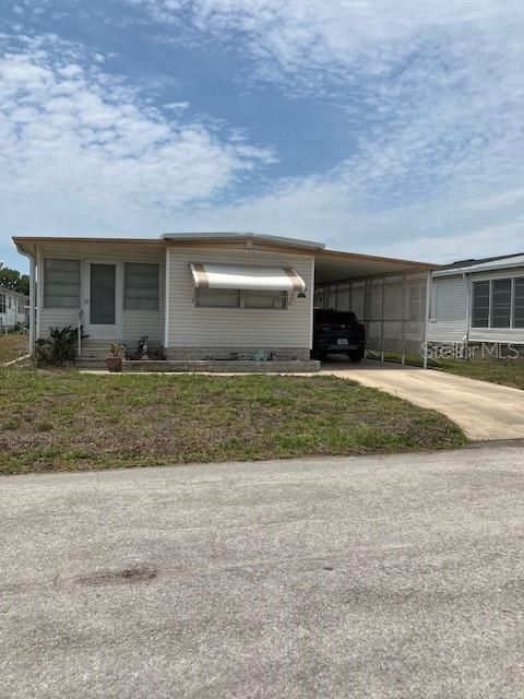 Photo of 2341 Baron Drive, Holiday, FL 34690 (MLS # W7885710)