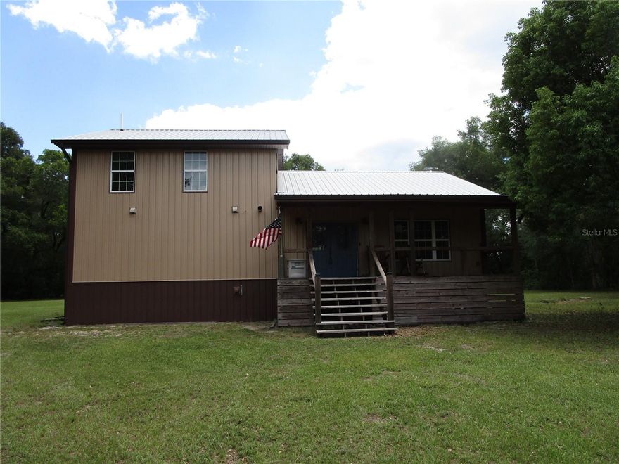 **CASH ONLY *Are you looking for a diamond in the rough? Bring your chisel and imagination! This property has great bones and an excellent floor plan just needs you to come finish it! Downstairs features a great room, kitchen goes on the back wall the grey cabinets are in the house, pantry, great room with a fireplace. Primary bedroom is downstairs it's a generous size, primary bathroom features two sinks, large walk in shower, huge walk in closet. Upstairs there are two bedrooms and a full bath. Southern style front porch facing west great for sunsets. 4.63 acres to accommadate your horses, cows, pigs, chickens, RV's, boats, NO deed restrictions bring all the toys! There is an awesome detached two car garage with electric & water, has a workstation set up and an extra bonus room/ man cave with a portable ac unit. The house does need to be finished but it has a lot already there including: Septic tank, temporary power pole, plumbing, insulation, kitchen cabinets, gas water heater installed, AC vents and two condensers but NO handler. **CASH or you can look into a Hard money loan*** due to the unfinished condition
