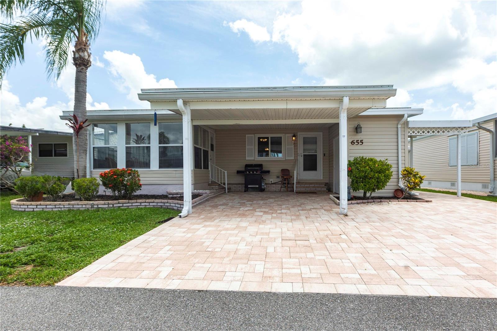 Your Perfect Winter Getaway Awaits! Are you searching for a winter retreat or a year-round home with a vibrant active lifestyle 55+ gated community ? Look no further! This beautifully maintained home is ready to welcome you with open arms
.Key Features:
Move-In Ready: Enjoy the ease of laminate flooring throughout (no carpet here!), neutral interior paint, and crown molding, making this home both stylish and low-maintenance. Newer paver driveway. Pride of ownership shines through out !
Furnished and Clean: This home comes fully furnished (as seen) and is spotless,!! ensuring a smooth ready to move in transition for you.
Enclosed Front Lanai: Relax and socialize with neighbors from your inviting front lanai—perfect for enjoying the outdoors.
Spacious Living: The open floor plan is bright and cheery, featuring a large primary bedroom with an En suite, ample storage, a guest bedroom, and a full bath.
Built-In Shelving: Ideal for entertaining or additional storage, this home truly maximizes space. freshly painted offering natural light and cozy and inviting decor
Parking: Convenient carport parking for one vehicle and a separate space for your golf cart.
Community Features:
Nestled in the beautiful Maple Leaf community, a resident-owned 55+ paradise, you’ll enjoy an active resort lifestyle that includes:
5 Tennis Courts, bocce ball, lawn bowling, and shuffleboard courts
2 Hot Tubs and a fully equipped fitness facility
Woodworker's Shop and pottery studio
Over 75 clubs and activities to choose from, including 2 pickleball courts
A restaurant and full-service bar for social gatherings, tiki bar
Investment Opportunity: The price includes a certificate share, providing you with ownership in this wonderful community. Don’t miss out on this true gem! Experience the pride of ownership and the incredible lifestyle Maple Leaf provides. Schedule your visit today and make this delightful home yours!