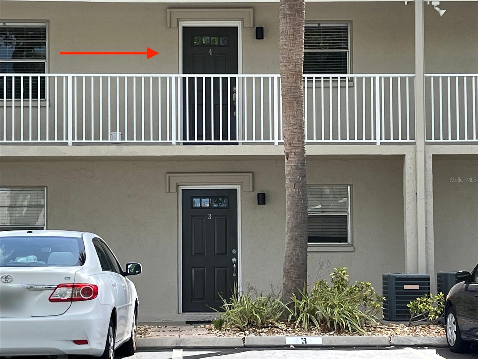 One or more photo(s) has been virtually staged. This is a must-see condominium! Located just minutes from Downtown Sarasota. This well-maintained second story 2 bedroom 1 bathroom has tile throughout. Granite countertops, updated appliances, and a washer/dryer in the unit. Plenty of closet space, and lighting fixtures have been updated as well. A screened-in patio overlooks the beautiful private park with winding sidewalks to enjoy a morning or evening walk. This secluded, gated community has amenities to enjoy as well. There are 2 pools, a fitness center, a clubhouse w/kitchen, and areas outdoors to grill. Enjoy Sarasota and the surrounding area for years to come in this little hidden gem.