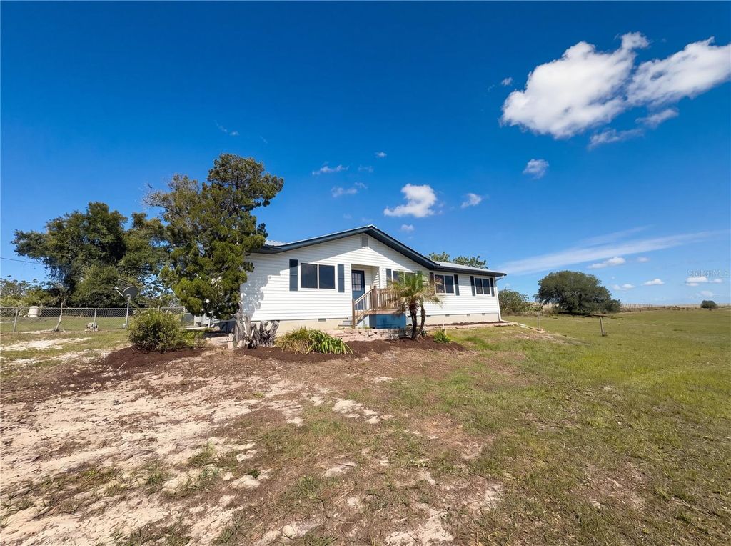 Photo of 7375 Us Highway 98 E, Fort Meade, FL 33841 (MLS # O6402950)
