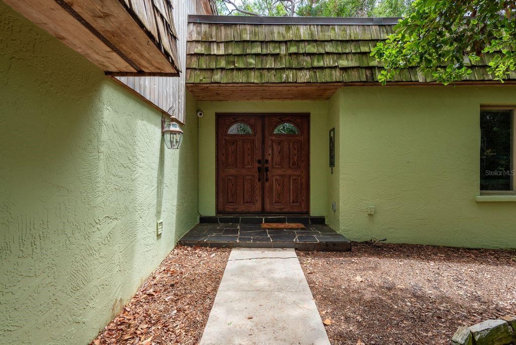 Photo of 2279 Ranchette Lane, Dunedin, FL 34698 (MLS # TB8386283)