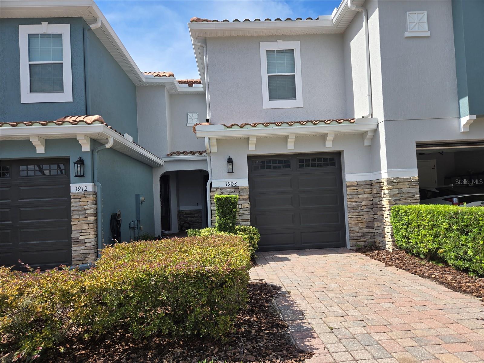 "Come see this beautiful quiet town home tucked back behind the Oviedo Mall in a gated community". When you walk through the front door you will be invited in with an open floor plan with great room and dining room combo. Hang out in the kitchen while you entertain guests at the bar. The kitchen has 42 inch cabinets and granite counter tops with seating for 5 at the bar. No rear neighbors! All bedrooms and laundry are upstairs. The master bedroom is good enough for a king size bed and has a two walk in closet. The two guest rooms have windows with a view of the greenbelt out back. If you like outdoor activities the Cross Seminole Trail is close by. You can even enjoy the bike ride on the trail. Shopping is just a short drive with easy access to the 417 and Red Bug Lake Dr.