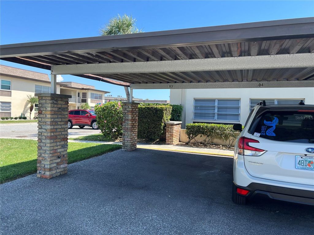 Photo of 4854 Marine Parkway #103, New Port Richey, FL 34652 (MLS # W7875878)