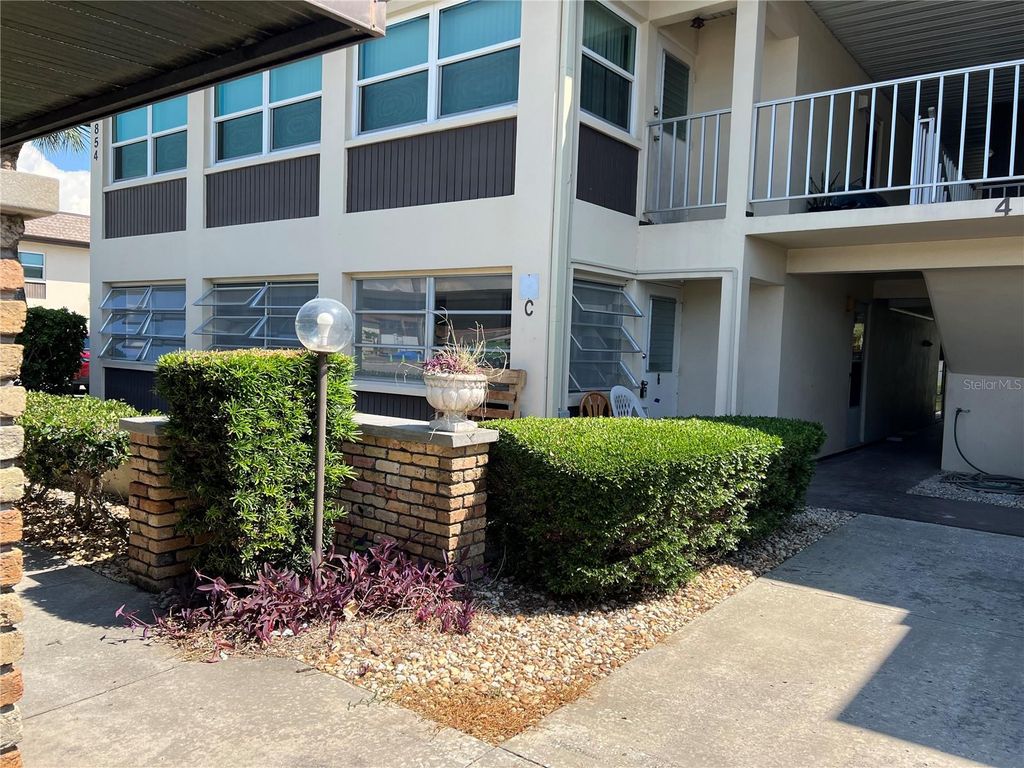 Photo of 4854 Marine Parkway #103, New Port Richey, FL 34652 (MLS # W7875878)