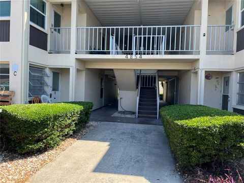 Photo of 4854 Marine Parkway #103, New Port Richey, FL 34652 (MLS # W7875878)