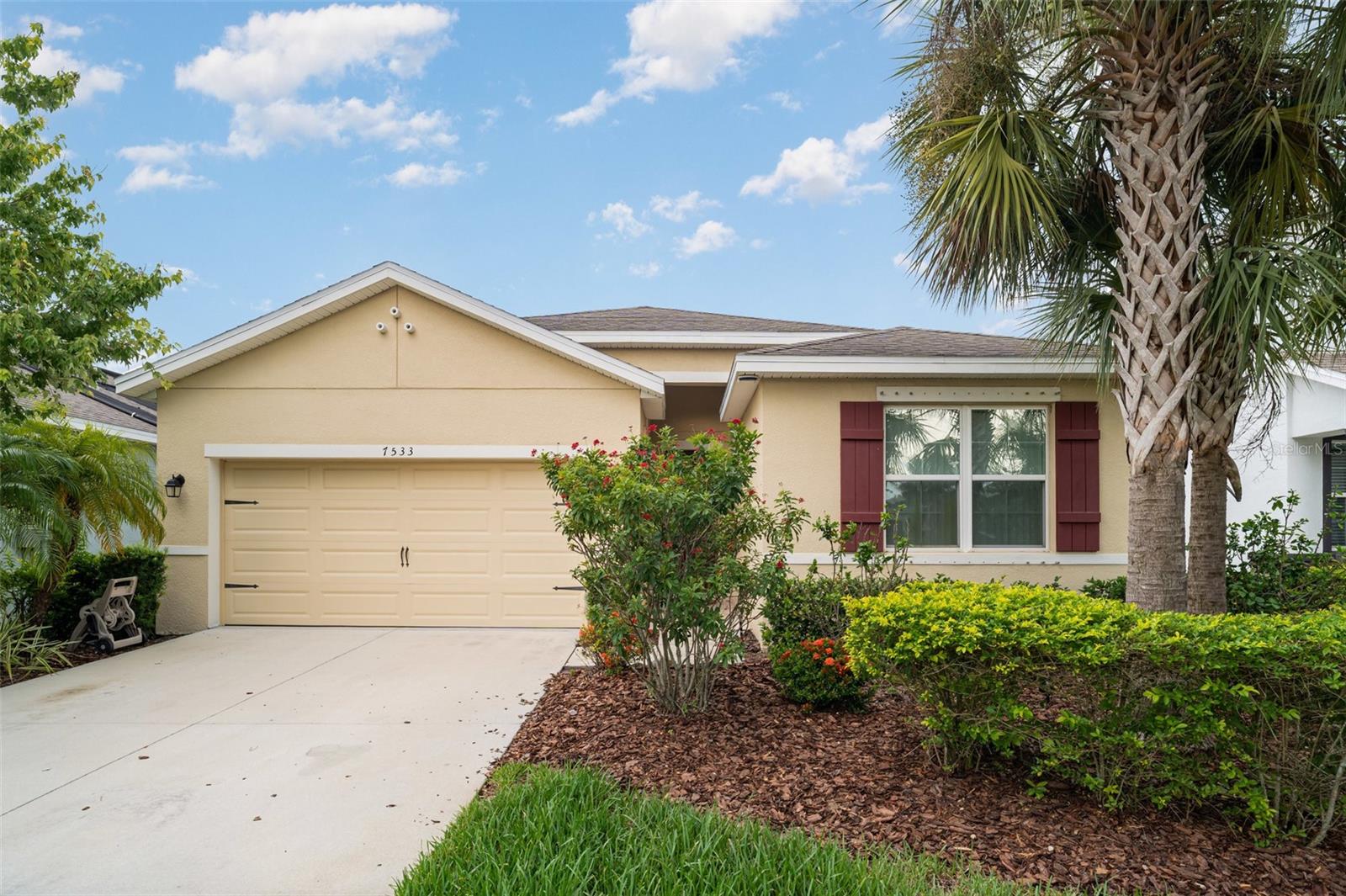 This stunning one-story home is designed for comfort, entertaining, and multi-generational living. Enjoy a saltwater pool perfect for hosting gatherings, relaxing in the Florida sun, or throwing unforgettable backyard parties. The home also features a separate in-law suite with a private entrance, offering ideal accommodations for extended family, guests, or even rental income potential.
Inside, the open-concept layout offers four spacious bedrooms and a bright, airy living area. The master bedroom is tucked away at the back of the home for privacy and includes a walk-in closet and a private en suite bathroom with dual vanities and a walk-in shower. Bedrooms two and three are located on the opposite side of the home and share a full bathroom, while the fourth bedroom adds flexibility for a guest room or office.
The kitchen comes fully equipped with a range, microwave hood, and dishwasher, all overlooking the main living and dining areas—making it perfect for entertaining. A covered lanai provides the ideal space to enjoy the outdoors, rain or shine, and the backyard offers extra peace and privacy with no rear neighbors.
Located in Waterset, a vibrant 1,300-acre master-planned community in Apollo Beach, this home is just 17 miles south of Tampa and offers convenient access to Tampa Bay, Bradenton, and major employment centers. The community is known for its resort-style amenities, walking trails, playgrounds, and a true sense of neighborhood connection.