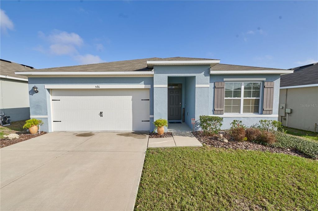 Photo of 576 Boardwalk Avenue, Haines City, FL 33844 (MLS # O6388345)