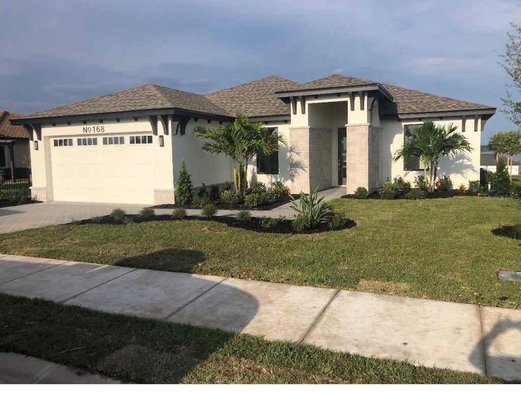 Photo of 168 Fringe Tree Dr, Lake Alfred, FL 33850 (MLS # O6397725)