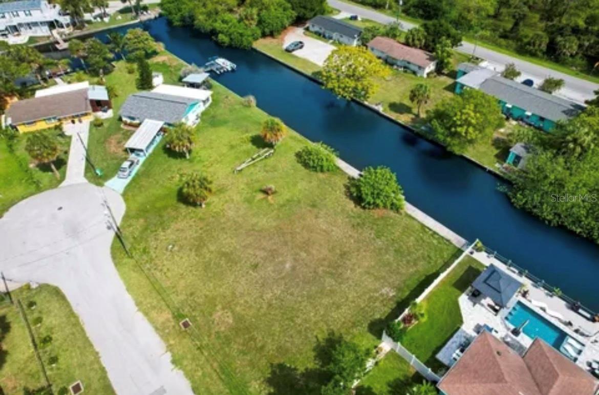 Reduced! Motivated Seller. Don’t miss this rare opportunity to own a fully cleared, build-ready waterfront lot with direct Gulf access! This huge double lot property sits on a peaceful canal and features a sturdy sea wall recently constructed and two davits – perfect for boating enthusiasts. Whether you’re looking to build your dream home or invest in premium coastal real estate, this lot checks every box. No need for clearing or prepping – it’s all been done for you.