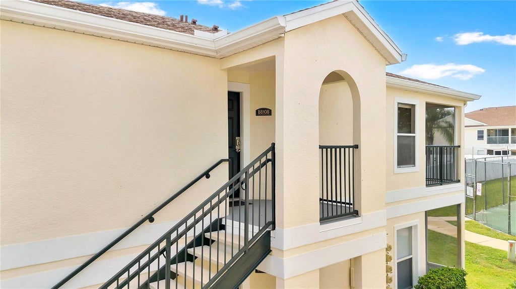Photo of 8810 Grand Palms Circle #B, Kissimmee, FL 34747 (MLS # O6446760)