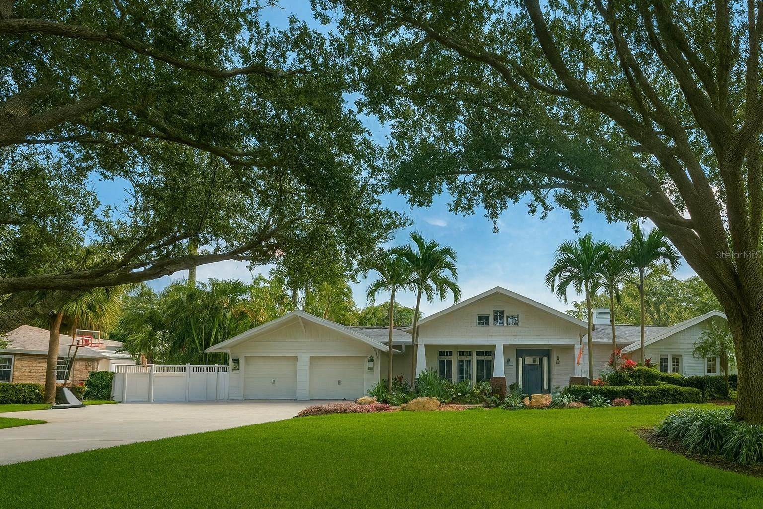 Welcome to 607 51st Street NW – where timeless design meets modern living in one of Northwest Bradenton’s most sought-after neighborhoods.
Completely reimagined from top to bottom, this 4 bedroom plus bonus room and office, 3.5 bath luxury residence spans over 4,200 square feet under air and exudes designer sophistication throughout. Every element of this home was curated for style, comfort, and peace of mind — from the newer roof, new HVAC systems, and impact-rated windows and doors, to the whole-home generator and surge protection for complete reliability.
Step inside and you’ll be greeted by luxury vinyl plank flooring flowing seamlessly through bright, open living spaces. The chef’s kitchen is a showpiece — thoughtfully designed with custom cabinetry, premium finishes, and high-end appliances that make both entertaining and everyday cooking a pleasure.
A true highlight of this home is the fully equipped mother-in-law suite with its own private entrance — perfect for extended family, guests, or use as a secluded home office or studio. This versatile space adds exceptional flexibility without compromising the home’s cohesive design and flow.
Throughout the home, designer touches and custom upgrades showcase craftsmanship and attention to detail, creating a perfect balance of comfort and elegance. Multiple living areas and a flexible layout make it ideal for families or those who love to entertain.
Outdoors, a resort-style pool anchors the lushly landscaped backyard, complemented by a covered patio and built-in grill area — perfect for gatherings or quiet evenings at home. The front and back patios extend the living space, while the two-car garage adds convenience and storage.
Situated on one of the most desirable streets in NW Bradenton, this home offers easy access to Robinson Preserve, De Soto National Park, local marinas, and the pristine beaches of Anna Maria Island. Enjoy a relaxed coastal lifestyle close to top-rated schools, parks, and restaurants — all with no HOA restrictions.