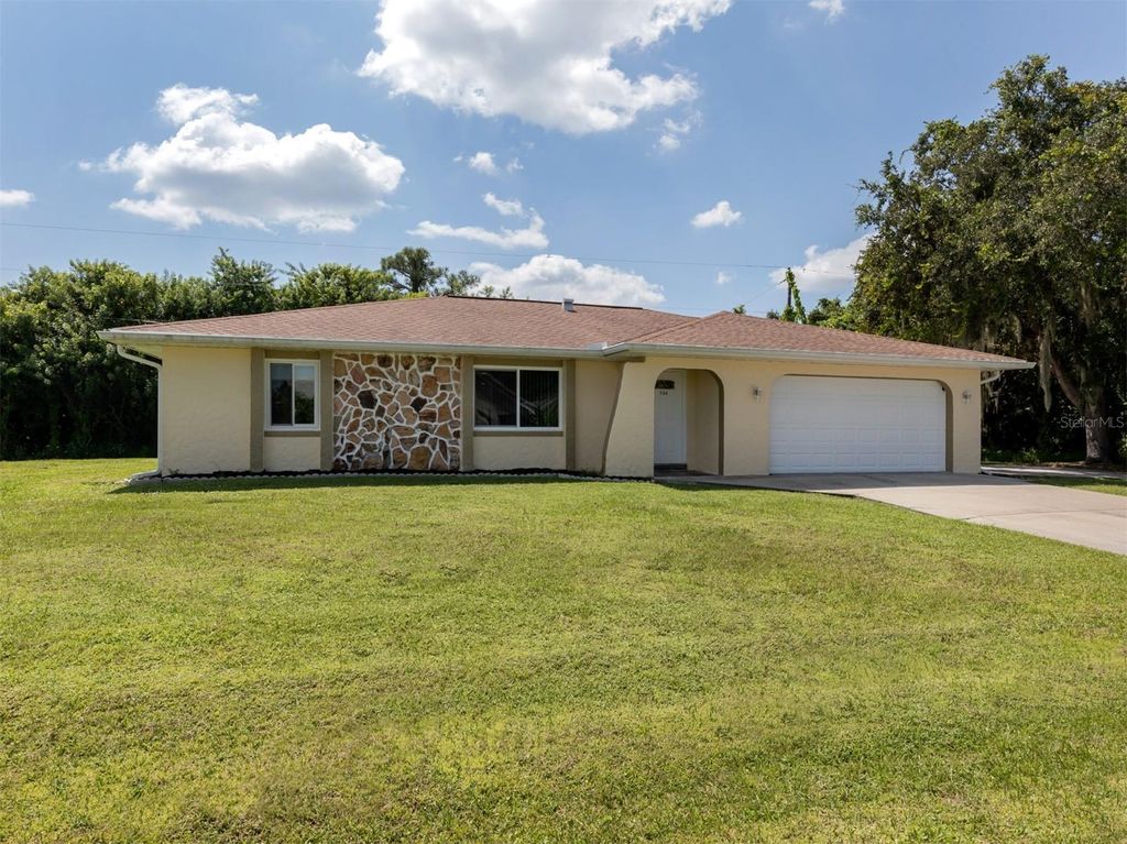 Photo of 733 Springview Avenue NW, Port Charlotte, FL 33948 (MLS # N6140096)