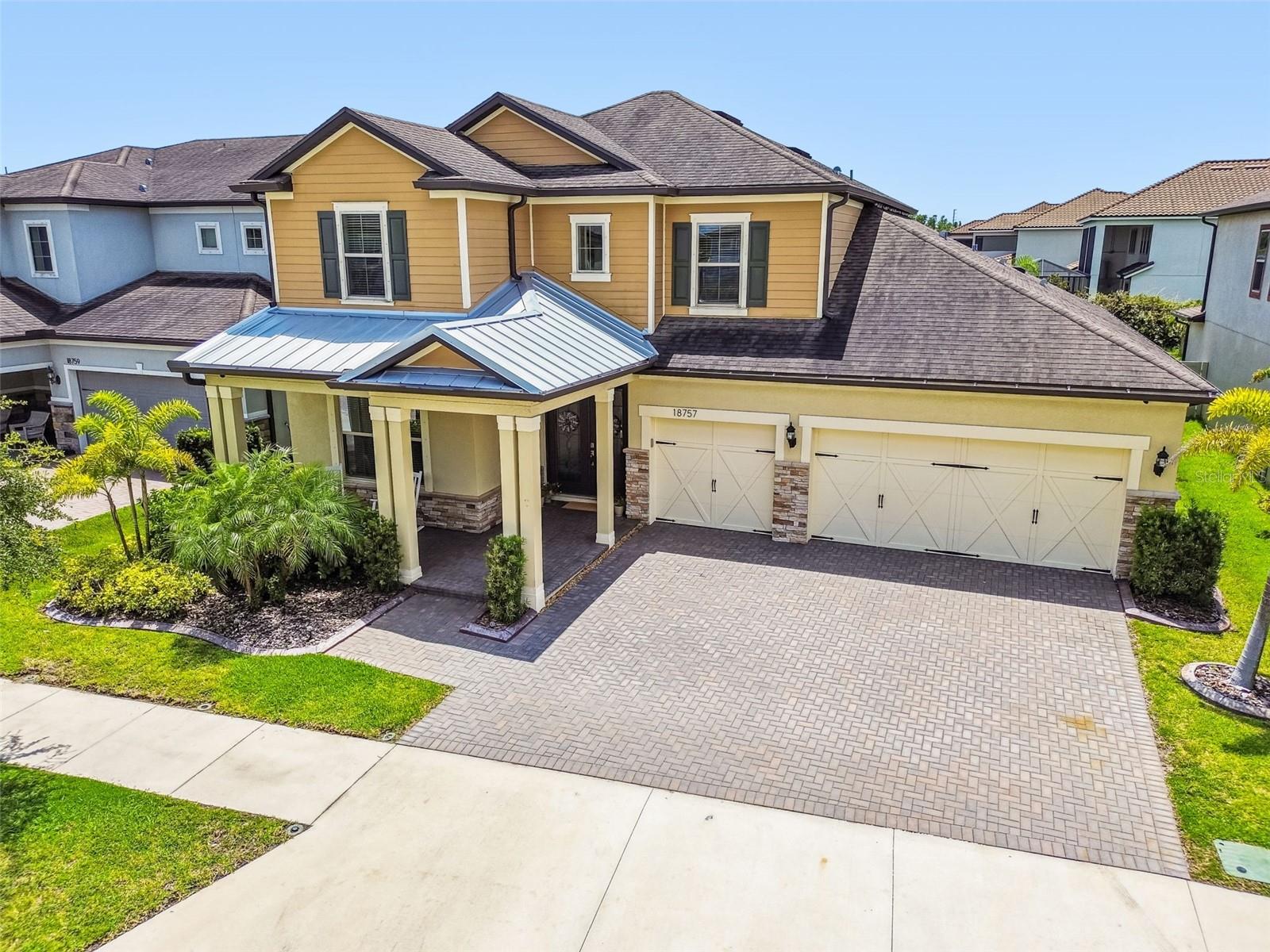 Absolutely stunning move-in ready home is located in a gated community with Grade A schools and a resort style community pool and playground. As you arrive to this lush neighborhood of Birchwood Preserve you will notice the attention to detail as you pull up to this
gorgeous home that offers impeccable curb appeal including beautiful paver driveway, landscaped curbing and serene porch. This executive home features 4 bedrooms and 3.5 bathrooms, with a total of 3,439 square feet of living space. If you like to entertain, you are going to love the amazing extended kitchen offering 42" staggered white cabinets that extend the entire wall of the eat-in cafe space, with crown molding, underpot storage drawers. custom backsplash, high end faucet and amazing pendant lights complete the family and the entertainment friendly space. The whole back of the house opens up through triple sliders to the perfectly manicured backyard retreat including a paver covered patio space. Also opening to the fully fenced in backyard is the LARGE master retreat, including luxurious bath with an oversized walk in shower with porcelain and a 2nd rain head shower head, double sinks, granite counter and huge walk in closet system. Upstairs you will find a large bonus/loft area perfect for playing game, exercise space, or an in home movie theater. There are 3 additional bedrooms and 2 full bathrooms with additional two storage closets on this second floor. This home offers a 3 car garage with additional storage space including cabinets and overhead storage for garage organization. This home has too many upgrades to list. This is a MUST SEE in person home. Schedule your appointment today