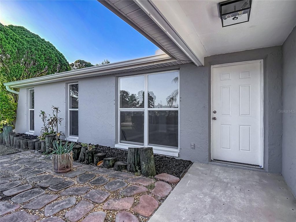 Photo of 5710 Bittersweet Drive, Holiday, FL 34690 (MLS # TB8492872)