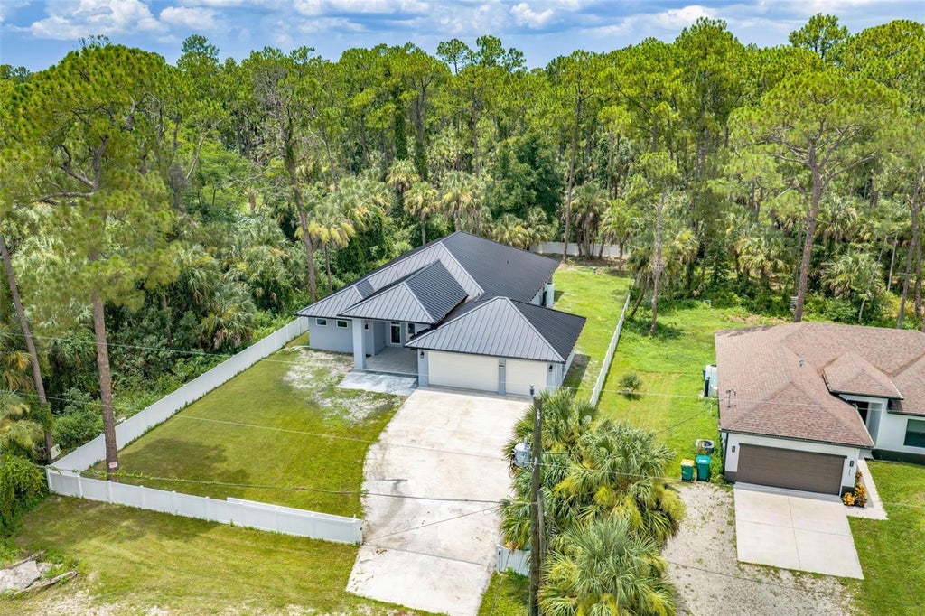 Photo of 1853 Della Drive, Naples, FL 34117 (MLS # D6148176)