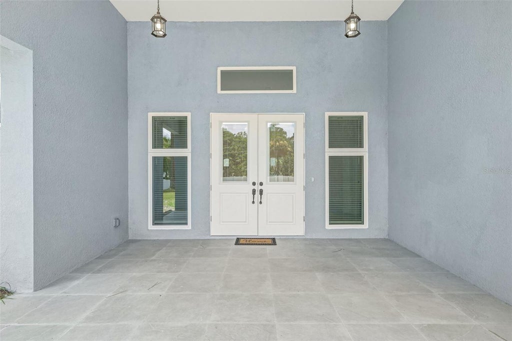 Photo of 1853 Della Drive, Naples, FL 34117 (MLS # D6148176)