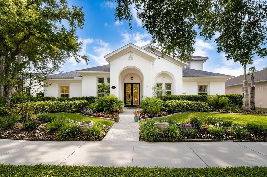 One or more photo(s) has been virtually staged. Your Florida dream home awaits in the award-winning community of FishHawk Ranch! This stunning WestBay executive pool home combines luxury finishes, spacious living, and resort-style outdoor spaces to create the ultimate Florida lifestyle. One of the home’s most valuable recent upgrades is the BRAND-NEW roof installed in 2025 by Westfall Roofing, complete with a transferable warranty for added peace of mind. New gutters were also installed at the same time, adding both function and curb appeal. Additional updates include a water heater replaced in 2023, newer pool heater, and an upgraded kitchen with beautiful modern finishes. Featuring 4 bedrooms, 4 bathrooms, a private office, bonus room, and a 3-car garage across more than 3,400 square feet, this home was designed for both effortless entertaining and comfortable everyday living. Nestled in one of FishHawk Ranch’s most sought-after villages, the home immediately captivates with lush tropical landscaping, manicured grounds, and impressive curb appeal. A paver walkway leads to the grand covered front entry and double 8-foot decorative glass doors, welcoming you into soaring 12-foot ceilings, an open-concept layout, and upscale finishes throughout. Just off the foyer, the executive office offers custom built-ins, a stunning stone fireplace, and elegant 8-foot glass French doors—creating the perfect work-from-home retreat. Across the hall, the formal dining room flows seamlessly through a butler’s pantry into the chef-inspired gourmet kitchen featuring quartz countertops, designer backsplash, stainless steel appliances, gas cooktop, oversized island, and abundant cabinetry overlooking the spacious great room and sparkling pool views beyond. Designed with entertaining in mind, the great room opens effortlessly through expansive 6-panel sliding glass doors to your private outdoor oasis. The luxurious owner’s retreat features laminate flooring, tray ceilings, barn doors, and oversized walk-in closets complete with custom California Closets organization systems. The spa-like ensuite offers dual vanities, a garden tub, and an oversized walk-in shower. Two additional bedrooms and baths are conveniently located on the first floor, while upstairs offers a large bonus room along with a private fourth bedroom and full bath—ideal for guests or multigenerational living. Step outside and enjoy true Florida living with a resort-style outdoor space showcasing travertine pavers, a free-form pool, heated spillover spa, and generous covered lanai perfect for year-round entertaining. Living in FishHawk Ranch means enjoying world-class amenities including resort-style pools, an aquatic center with a 32-foot waterslide and beach-entry pool, parks, playgrounds, miles of walking trails, shops, restaurants, and top-rated schools. This exceptional home truly offers the best of luxury, comfort, and community living. Schedule your private showing today!