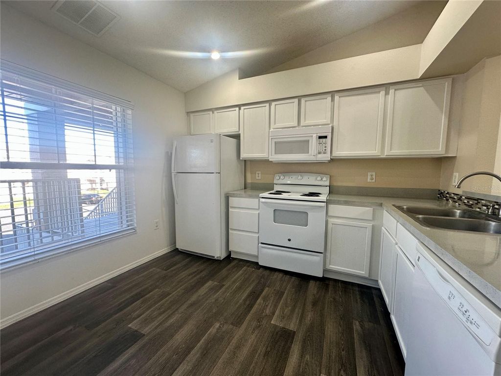 Photo of 13348 Fairway Glen Drive #202, Orlando, FL 32824 (MLS # O6401589)