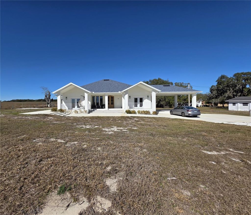 Photo of 359 Terminal Avenue, Polk City, FL 33868 (MLS # A4679091)