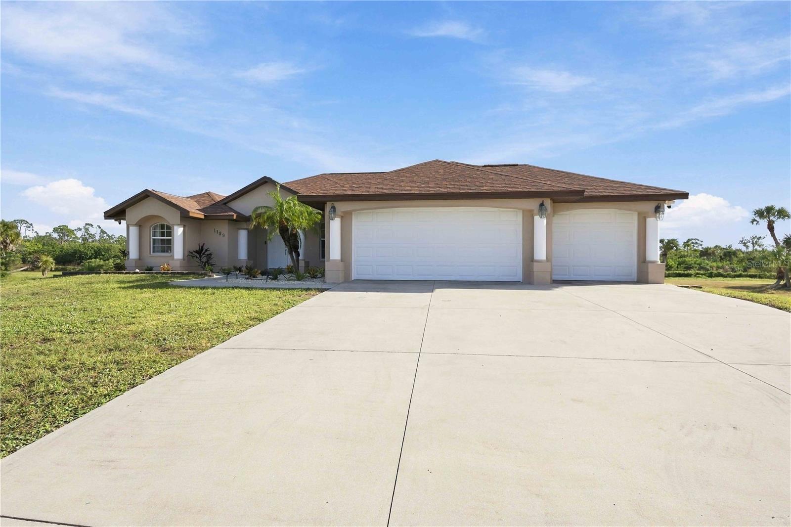 1159 BOUNDARY BOULEVARD, ROTONDA WEST, FL, 33947 4 1159 BOUNDARY BOULEVARD