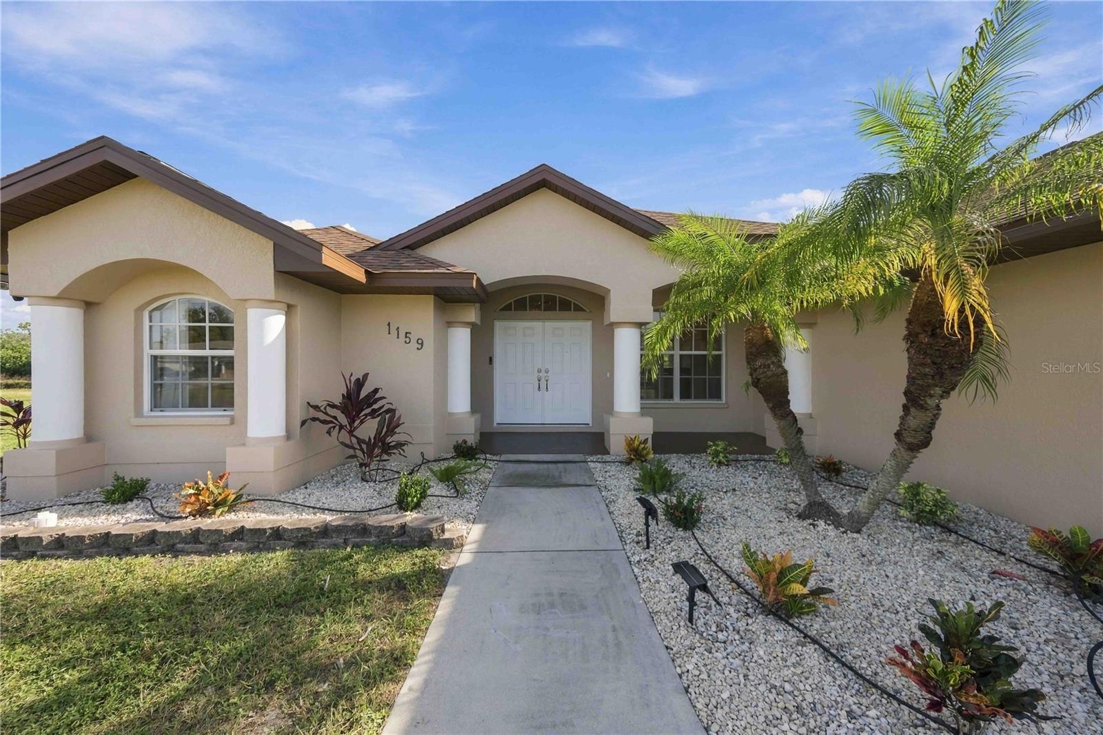 1159 BOUNDARY BOULEVARD, ROTONDA WEST, FL, 33947 3 1159 BOUNDARY BOULEVARD