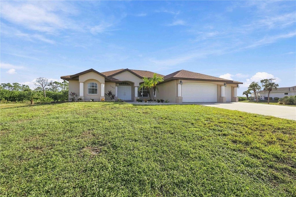Photo of 1159 Boundary Boulevard, Rotonda West, FL 33947 (MLS # D6149454)