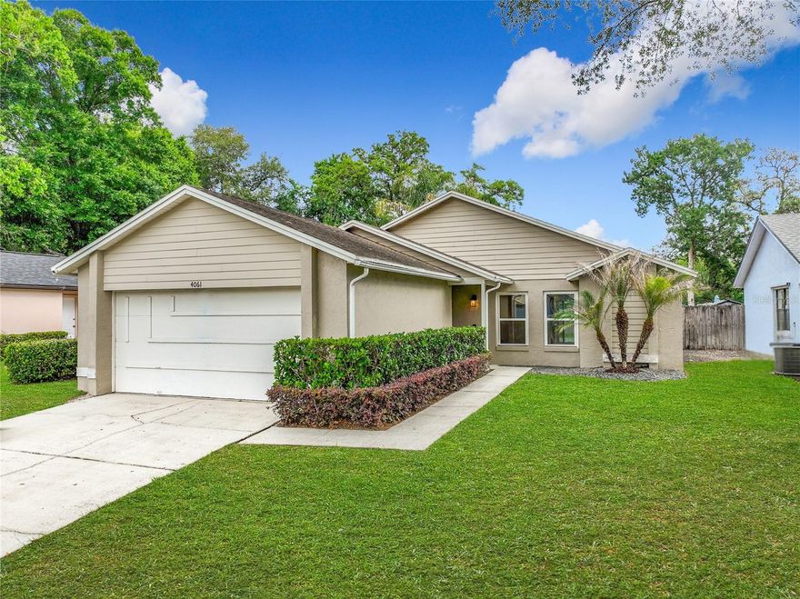 Welcome to the highly desirable Fox Hollow neighborhood in Deer Run, one of Casselberry’s most sought-after communities. This well-maintained 3-bedroom, 2-bath home is move-in ready and offers a wonderful blend of thoughtful updates and comfortable living.
Freshly painted throughout, including walls, ceilings, and baseboards, the interior feels bright, clean, and inviting. The home features fully renovated bathrooms, updated windows and sliding glass doors, and luxury vinyl plank flooring in each bedroom. A charming walkway leads to the covered front porch, welcoming you into a foyer with a convenient hall closet. The kitchen offers a pantry, breakfast bar, and overlooks the spacious living room with vaulted ceilings and updated sliding glass door that opens to the expansive backyard, creating an ideal space for everyday living. The adjoining dining area flows seamlessly off the kitchen and living room. The generously sized primary suite features vaulted ceilings, a walk-in closet with built-ins, and private access to the backyard patio through new sliding doors. The beautifully updated en-suite bath includes a quartz vanity, a large shower, and direct access to the lanai, perfect for use as a future pool bath. Two additional guest bedrooms share a fully renovated second bathroom complete with a shower/tub combination, subway tile with decorative accent tile detail, and an updated quartz vanity. Additional highlights include tile flooring throughout the main living areas, LVP flooring in the bedrooms, ceiling fans throughout, a fully fenced spacious backyard, and a 2-car garage. The washer and dryer convey with the sale. Zoned for highly rated Seminole County schools, this home is also ideally positioned to benefit from the exciting Deer Run Park redevelopment project, a major community enhancement that will further elevate the neighborhood’s lifestyle appeal. The approved master plan includes approximately 3 miles of multipurpose walking and biking trails, nature trails, pedestrian bridges, playgrounds, picnic areas, expanded lakes and waterways, open green space, environmental restoration, and a future community building for public use—all thoughtfully designed to preserve the area’s natural beauty while creating exceptional recreational amenities for residents. This is a wonderful opportunity to own a beautifully updated home in one of Casselberry’s most established and desirable communities.