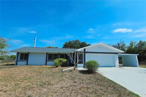 Photo of 4289 Yucatan Circle, Port Charlotte, FL 33948 (MLS # A4683127)
