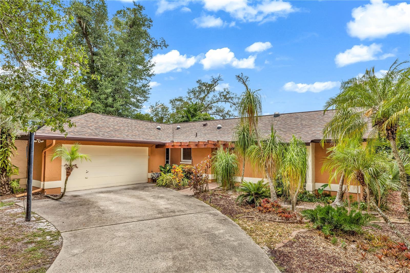 WOWSA! Pool homes with this kind of layout, amenities, & functionality rarely hit the market, especially with just one owner & a yard like this! Whether you’re upsizing, downsizing, or relocating, this is your chance to own a true hidden gem in Central Florida.
Wake up to sunshine streaming through skylights & sip your coffee poolside while surrounded by the bubbling of the waterfall on the built-in, jetted hot tub & blooming palms. Created for both peaceful mornings & memorable gatherings, inside this home you’ll find a warm & inviting kitchen that blends classic touches with thoughtful updates. Thirsty? Enjoy a water softener system plus a reverse osmosis system for the refrigerator water and ice dispensers and at night, have a cup of hot cocoa in front of the massive wood burning fireplace.
Escape to your private primary suite, complete with vaulted ceilings, tranquil views, generous closet spaces, & direct access to the real showstopper: a one-of-a-kind outdoor shower (used daily) that’s tucked away in a secluded garden alcove, perfect for rinsing off after a swim or indulging in a little open-air luxury. These unique touches along with a botanical garden-styled, irrigated yard will put this split-floorplan, open concept home at the top of your list.
Want great vibes, great flow, & even greater storage? This is it! Not only do you have tons of closet space, but an oversized garage with a new app-controlled garage door opener & shed. Other bonuses: newer appliances, fully fenced, fully replumbed, six Ring security cameras & solar pool heater!
Tucked into a quiet neighborhood with a tropical twist, you’re close to top-rated schools, Wekiva Springs, Historic Downtown Longwood, Advent hospital, Altamonte Mall, Crane's Roost Park, Sunrail, shopping, dining, & I-4 & 434 all while feeling a world away.
This home has personality, privacy, & peaceful vibes…it’s more than just a place to live, it’s a lifestyle.
?? Don’t Miss Out—Schedule Your Private Tour Today!