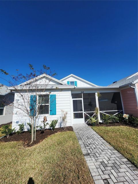 Photo of 218 Ocean Hammock Loop, Daytona Beach, FL 32124 (MLS # FC317687)