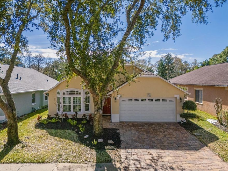 BEAUTIFUL WESTCHASE POOL HOME!!!! This 3/2/2 home sits on a PRIVATE LOT that has a serene conservation/pond view with NO REAR NEIGHBORS!!! The floorplan is highlighted with an open family/dining room, spacious living room with vaulted ceilings throughout, large primary bedroom suite with walk-in-closet, dual vanities, garden tub, and walk-in-shower. RECENT UPGRADES INCLUDE: NEW ROOF (2026), NEW LUXURY VINYL FLOORING (2026), NEW A/C SYSTEM (2021), NEW LED LIGHTS (2021), NEW POOL HEATER (2020), NEW WATER SOFTENER SYSTEM (2020), NEW HURRICANE WINDOWS and GARAGE DOOR (2018), NEW DRIVEWAY PAVERS (2018), NEW KITCHEN REMODEL including new cabinets and quartz countertops (2018), NEW HARDWOOD FLOORS (2018), NEW POOL PATIO MARBLE AND POOL TILES (2018), NEW INTERIOR DOORS (2018), REMODELED FIREPLACE (2018), and PLANTATION SHUTTERS. NOT IN A FLOOD ZONE AND WAS NOT AFFECTED BY 2024 HURRICANES. Westchase amenities include: walking trails, pickleball courts, tennis courts, community pools, parks, playgrounds, and basketball courts. This community is centrally located to highly rated schools, shopping, and dining destinations with easy access to the Veterans Expressway and Hillsborough Ave./Tampa Road. This is one to definitely check out before it is gone! Contact me for a private showing today!