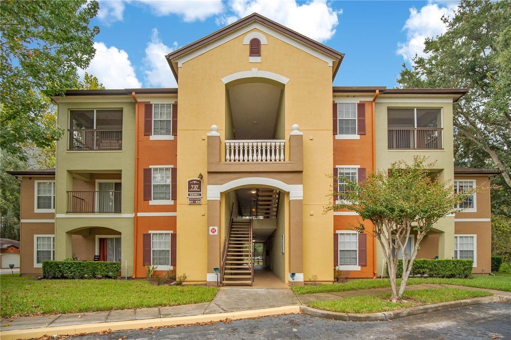Photo of 737 Crest Pines Drive #623, Orlando, FL 32828 (MLS # O6452913)