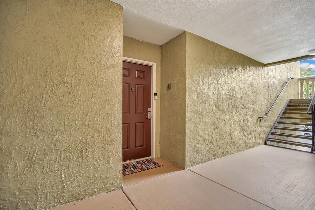 Photo of 737 Crest Pines Drive #623, Orlando, FL 32828 (MLS # O6452913)