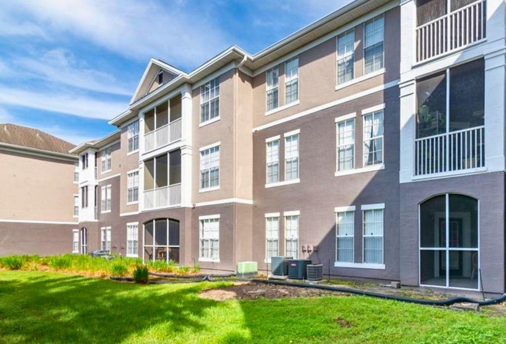 Photo of 9320 Crescent Loop Circle #206, Tampa, FL 33619 (MLS # J1000155)