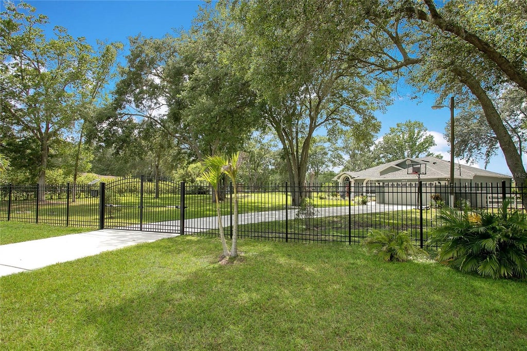 Photo of 19616 Livingston Avenue, Lutz, FL 33559 (MLS # TB8520764)